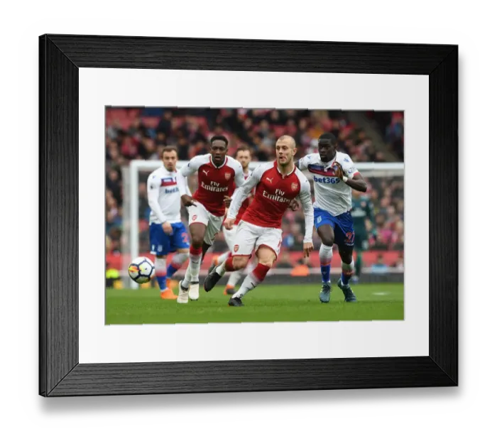 Framed Print : Jack Wilshere (Arsenal) Badou Ndiaye (Stoke). Arsenal 3: 0 Stoke City. Premier League