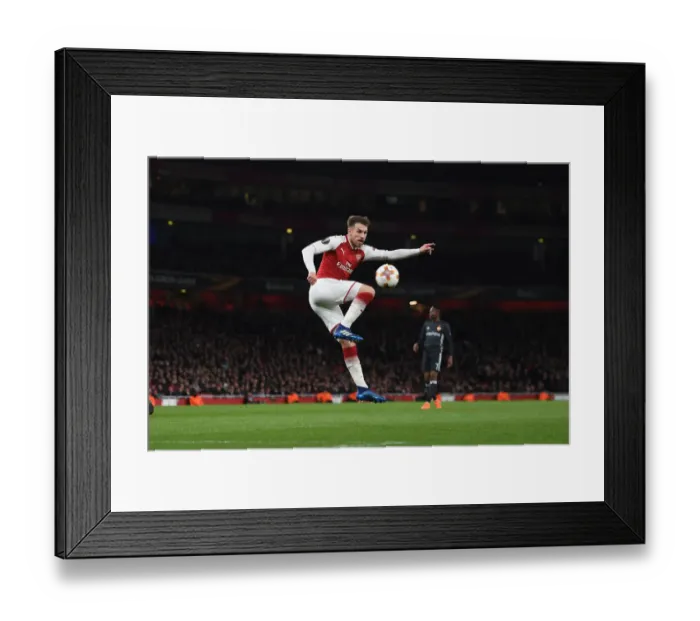 Framed Print : Aaron Ramsey Scores Arsenal's Third Goal Against CSKA Moscow in Europa League Quarterfinal Framed Print : Aaron Ramsey Scores Arsenal's Third Goal Against CSKA Moscow in Europa League Quarterfinal