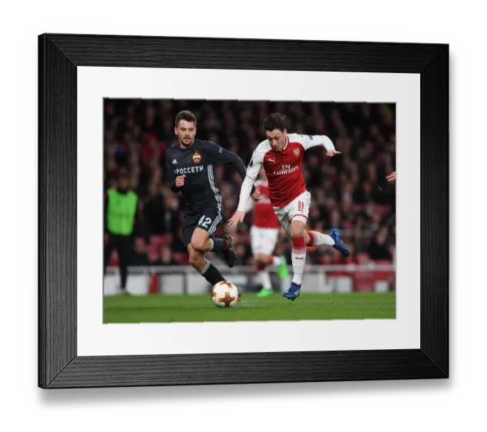Framed Print : Mesut Ozil vs. Georgi Schennikov: A UEFA Europa League Battle