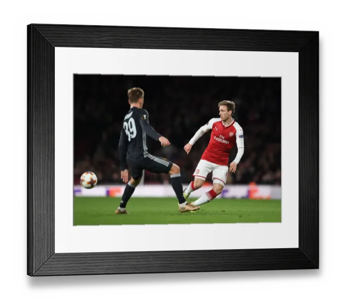 Framed Print : Monreal Outmaneuvers Kuchaev: Arsenal vs CSKA Europa League Quarterfinal Showdown