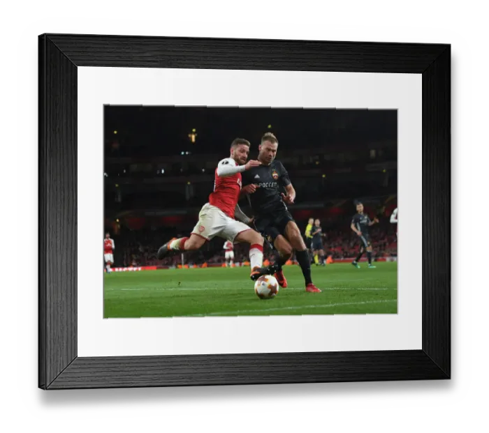 Framed Print : Mustafi vs Berezutski: Battle for Air Supremacy in Arsenal's Europa League Clash with CSKA Moscow