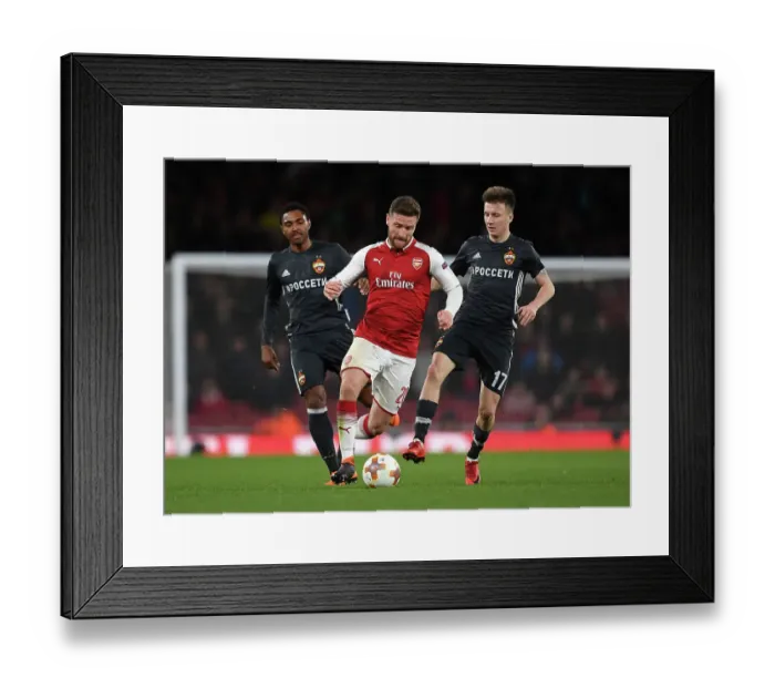 Framed Print : Mustafi vs. Golovin: Arsenal vs. CSKA Moscow - UEFA Europa League Quarterfinal Showdown