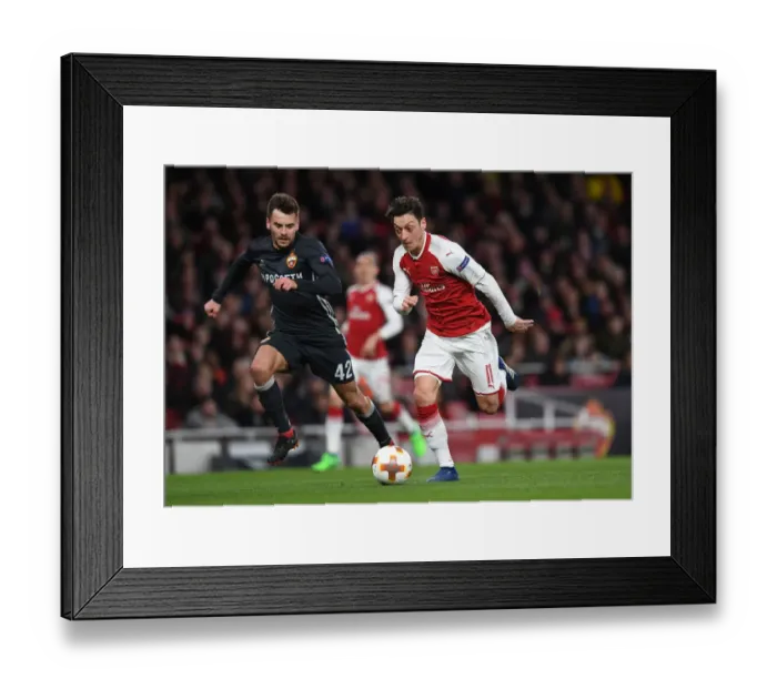 Framed Print : Mesut Ozil vs. Georgi Schennikov: A UEFA Europa League Battle Framed Print : Mesut Ozil vs. Georgi Schennikov: A UEFA Europa League Battle