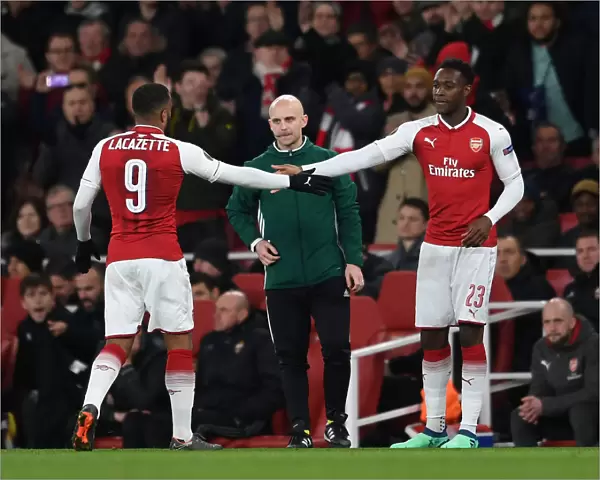 Alexandre Lacazette and Danny Welbeck: A High-Fiving Moment from Arsenal's Europa League Quarterfinal against CSKA Moscow