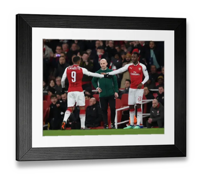 Framed Print : Alexandre Lacazette and Danny Welbeck: A High-Fiving Moment from Arsenal's Europa League Quarterfinal against CSKA Moscow