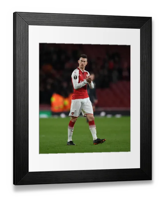 Framed Print : Laurent Koscielny Celebrates with Arsenal Fans after Europa League Quarterfinal Win