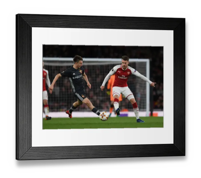 Framed Print : Arsenal vs CSKA Moskva: Ramsey vs Golovin Battle in Europa League Quarterfinal