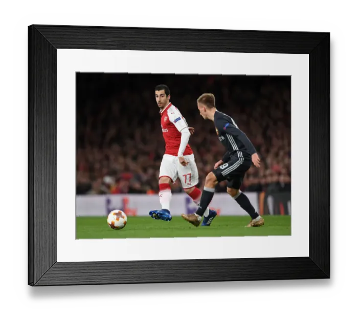 Framed Print : Arsenal's Mkhitaryan Fends Off CSKA's Kuchaev in Europa League Quarterfinal Clash Framed Print : Arsenal's Mkhitaryan Fends Off CSKA's Kuchaev in Europa League Quarterfinal Clash