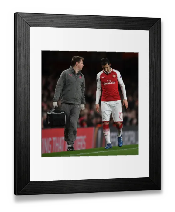 Framed Print : Arsenal's Henrikh Mkhitaryan Receives Treatment from Physio Colin Lewin during UEFA Europa League Match vs CSKA Moscow Framed Print : Arsenal's Henrikh Mkhitaryan Receives Treatment from Physio Colin Lewin during UEFA Europa League Match vs CSKA Moscow