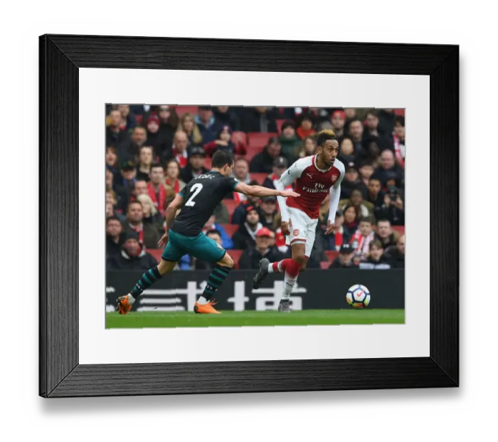 Framed Print : Arsenal's Aubameyang Faces Off Against Southampton's Cedric in Premier League Clash Framed Print : Arsenal's Aubameyang Faces Off Against Southampton's Cedric in Premier League Clash