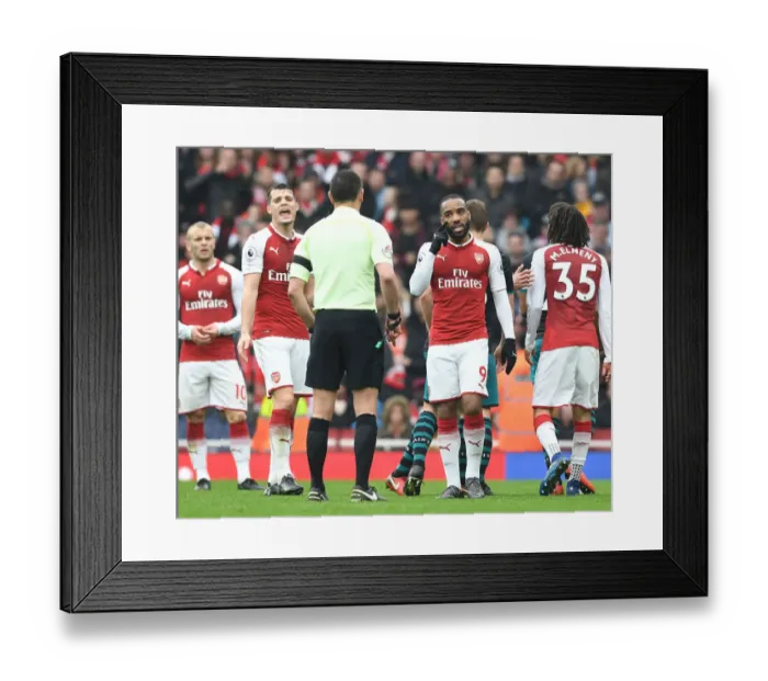 Framed Print : Arsenal's Xhaka and Lacazette Protest Referee Decision During Arsenal v Southampton Premier League Match