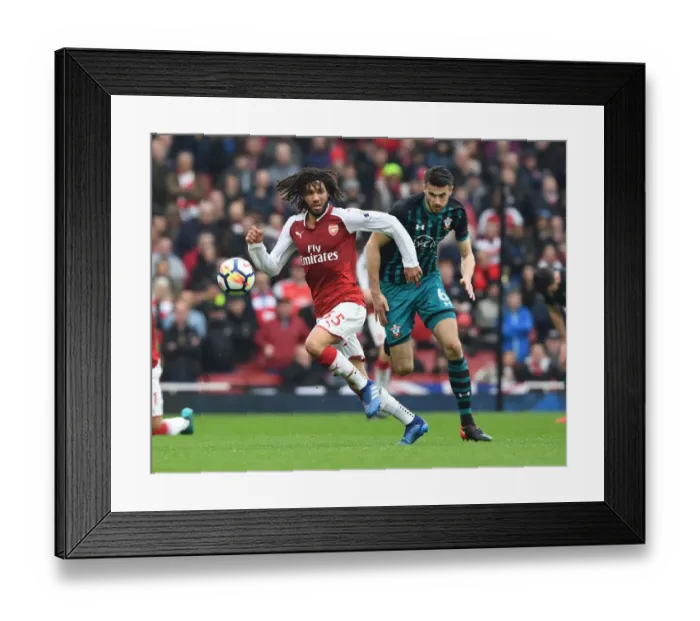 Framed Print : Arsenal's Mo Elneny Outmaneuvers Southampton's Wesley Hoedt