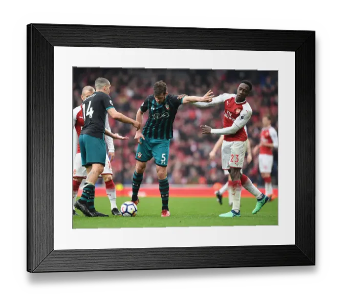 Framed Print : Clash of the Titans: Welbeck vs. Stephens in Arsenal vs. Southampton Premier League Showdown