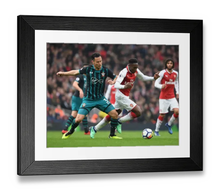 Framed Print : Clash at Emirates: Welbeck vs Yoshida in Arsenal vs Southampton Premier League Battle