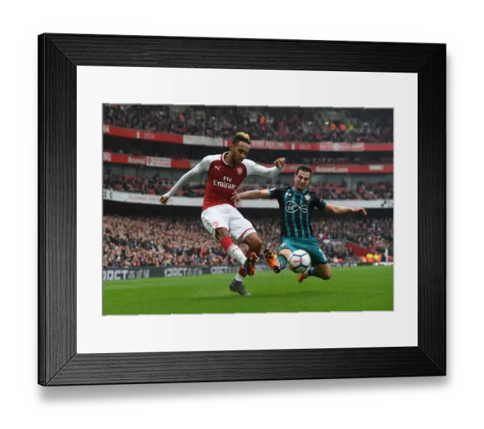 Framed Print : Aubameyang vs. Cedric: Intense Battle at Emirates Stadium - Arsenal vs. Southampton, Premier League