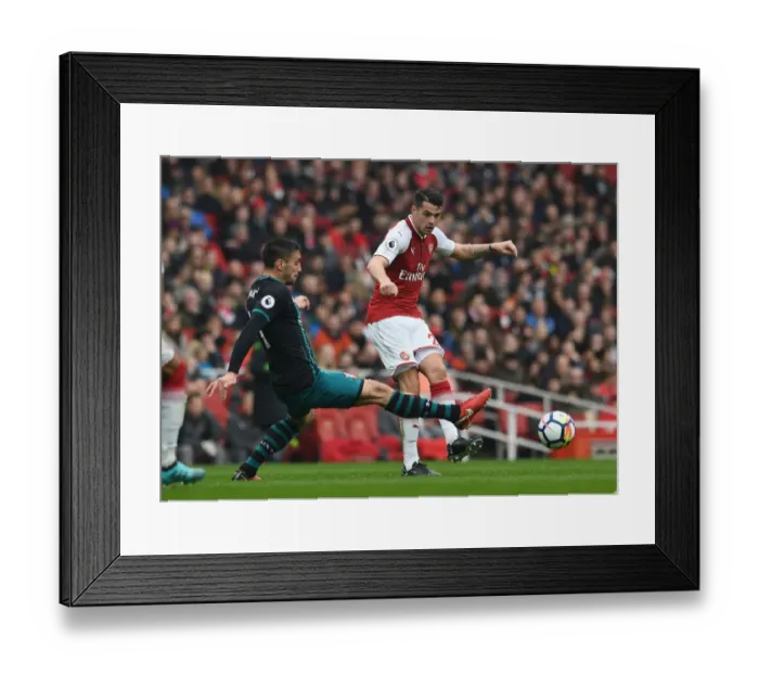 Framed Print : Xhaka vs. Tadic: Intense Battle in Arsenal vs. Southampton Premier League Clash Framed Print : Xhaka vs. Tadic: Intense Battle in Arsenal vs. Southampton Premier League Clash