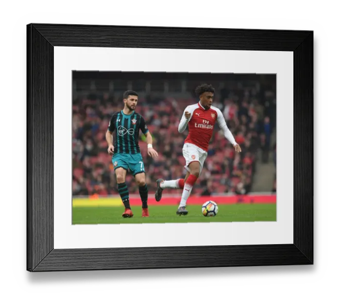 Framed Print : Arsenal's Alex Iwobi Clashes with Southampton's Shane Long in Premier League Showdown Framed Print : Arsenal's Alex Iwobi Clashes with Southampton's Shane Long in Premier League Showdown
