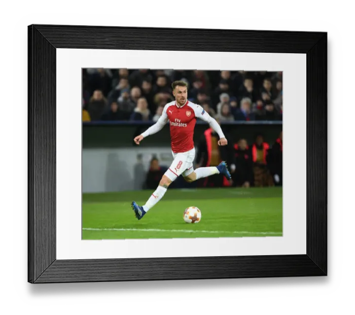 Framed Print : Arsenal's Europa League Battle: Aaron Ramsey Fights for Victory against CSKA Moscow (2018)