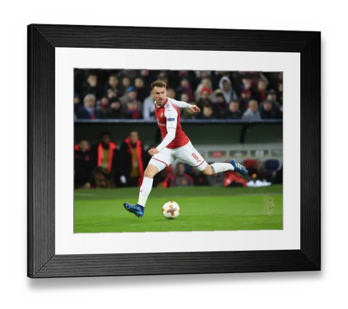 Framed Print : Aaron Ramsey in Action: Arsenal's Europa League Battle against CSKA Moscow (2018), Moscow