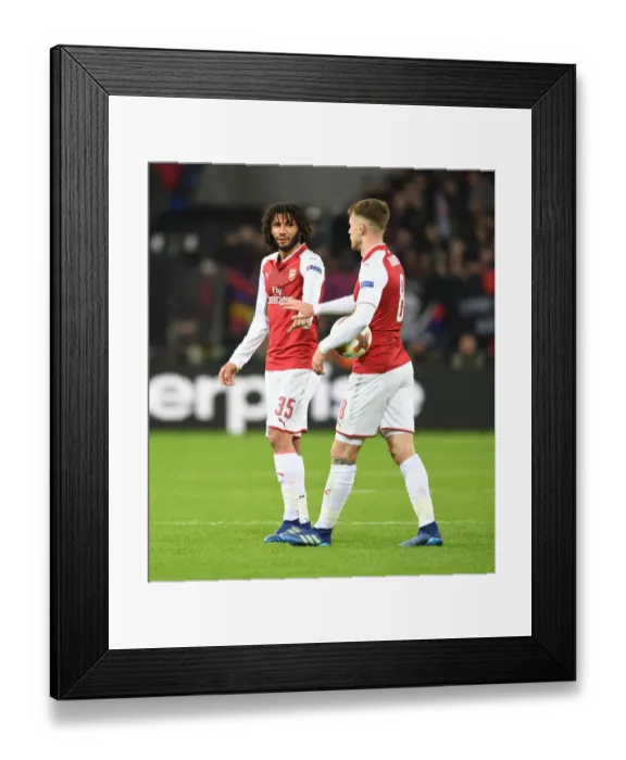 Framed Print : Arsenal's Elneny and Ramsey in Action against CSKA Moscow, UEFA Europa League Quarterfinals