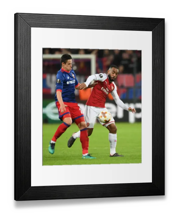 Framed Print : Alex Lacazette vs. Vasili Berezutski: A Battle in the UEFA Europa League Quarterfinals