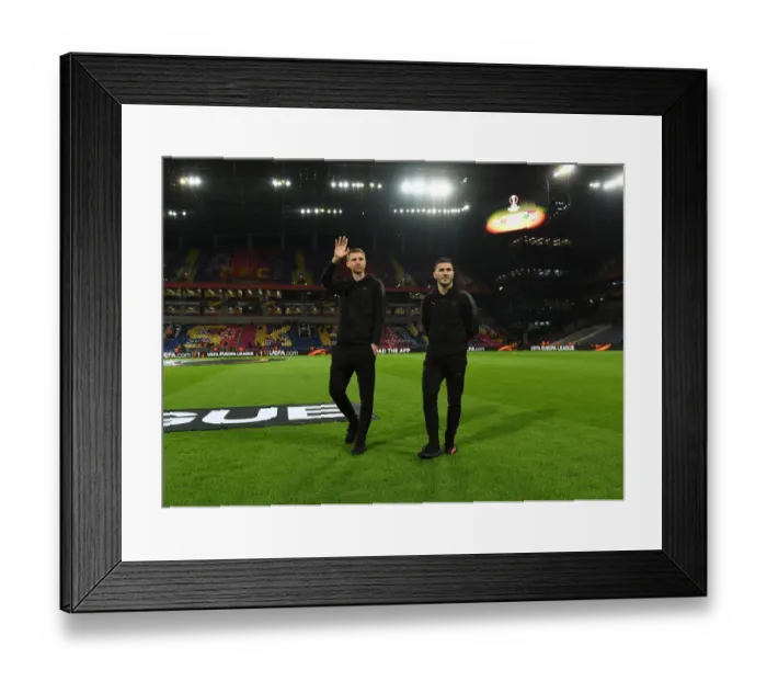 Framed Print : Arsenal Players Per Mertesacker and Sead Kolasinac Scouting the Pitch before CSKA Moskva vs Arsenal UEFA Europa League Quarterfinal