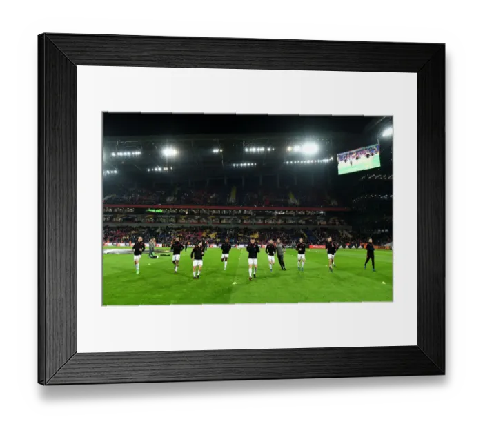Framed Print : Arsenal Players Warm Up Ahead of CSKA Moscow Europa League Clash
