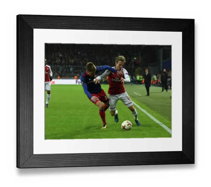 Framed Print : Nacho Monreal vs. Kirill Nababkin: A Battle in the Europa League Quarterfinals between CSKA Moscow and Arsenal FC
