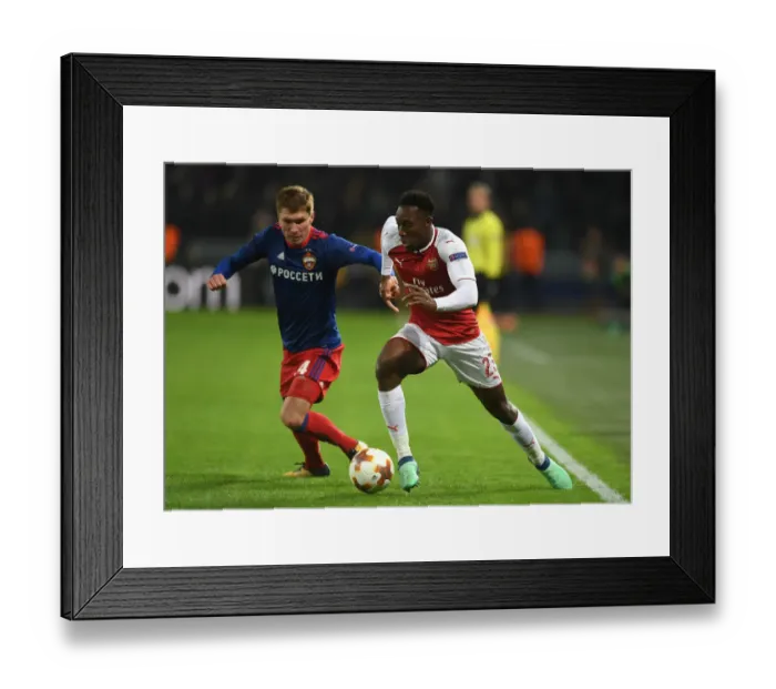 Framed Print : Welbeck vs. Nababkin: Arsenal's Battle in the Europa League Quarterfinals against CSKA Moscow