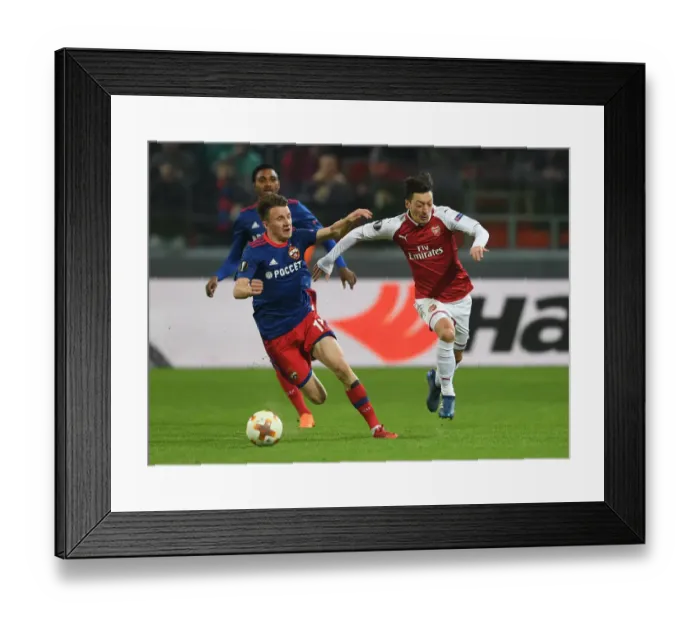 Framed Print : Ozil vs. Golovin: Europa League Showdown between CSKA Moscow and Arsenal FC