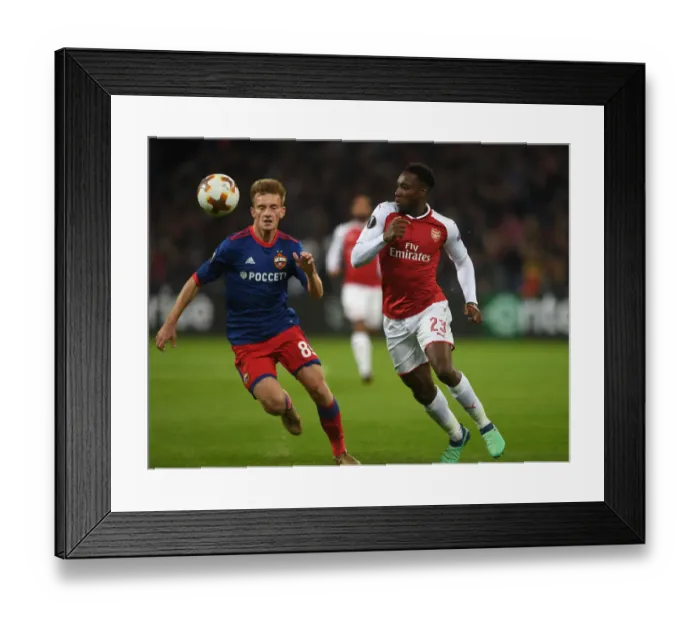 Framed Print : Arsenal's Danny Welbeck vs. CSKA Moscow's Konstantin Kuchaev: A Europa League Quarterfinal Showdown