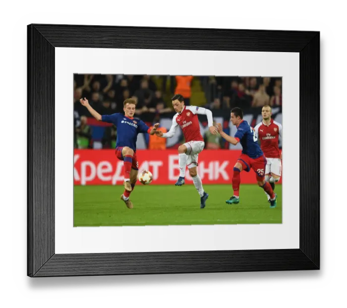 Framed Print : Ozil vs. Kuchaev: A Europa League Battle at the Heart of Midfield Framed Print : Ozil vs. Kuchaev: A Europa League Battle at the Heart of Midfield
