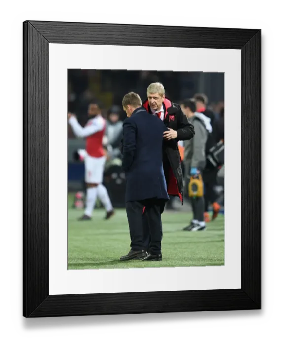Framed Print : Arsene Wenger and Viktor Goncharenko: Post-Match Conversation in the UEFA Europa League Quarterfinals between CSKA Moscow and Arsenal FC (April 2018)