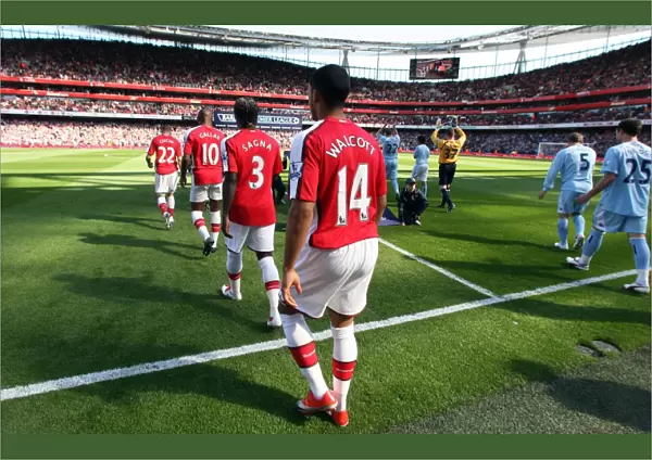Theo Walcott (Arsenal) walks out onto the pitch