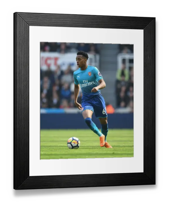 Framed Print : Arsenal's Midfield Sensation Joe Willock Dazzles in Premier League Clash Against Newcastle United Framed Print : Arsenal's Midfield Sensation Joe Willock Dazzles in Premier League Clash Against Newcastle United