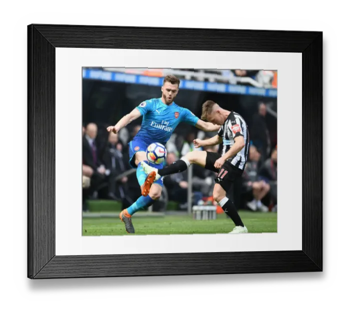 Framed Print : Clash at St. James Park: Chambers vs Ritchie in Intense Newcastle-Arsenal Battle Framed Print : Clash at St. James Park: Chambers vs Ritchie in Intense Newcastle-Arsenal Battle