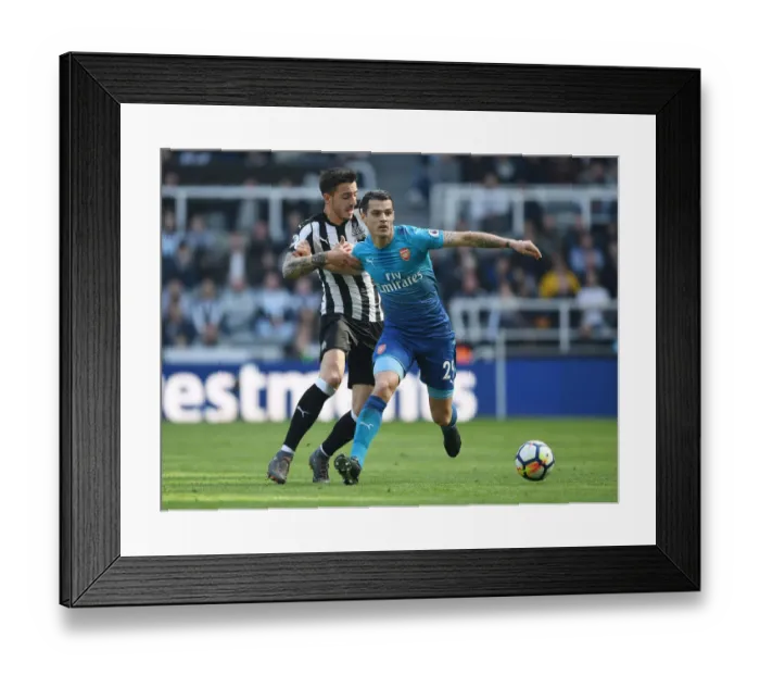 Framed Print : Granit Xhaka vs. Mikel Merino: Battle in the Midfield - Newcastle United vs. Arsenal, Premier League