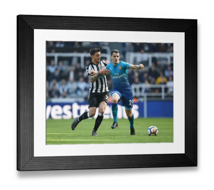 Framed Print : Battle in the Midfield: Xhaka Outmaneuvers Merino, Premier League 2017-18 - Arsenal's Xhaka Tops Newcastle's Merino in Epic Clash Framed Print : Battle in the Midfield: Xhaka Outmaneuvers Merino, Premier League 2017-18 - Arsenal's Xhaka Tops Newcastle's Merino in Epic Clash