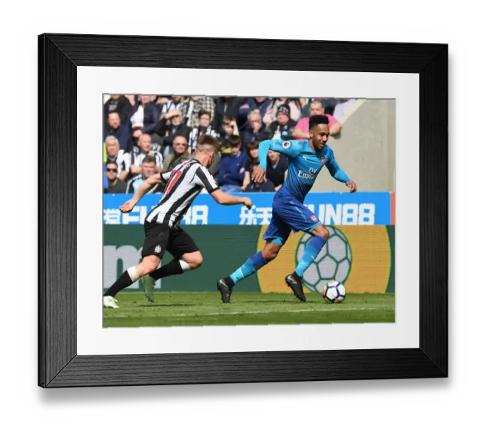 Framed Print : Arsenal's Aubameyang Outmaneuvers Newcastle's Ritchie in Premier League Clash Framed Print : Arsenal's Aubameyang Outmaneuvers Newcastle's Ritchie in Premier League Clash