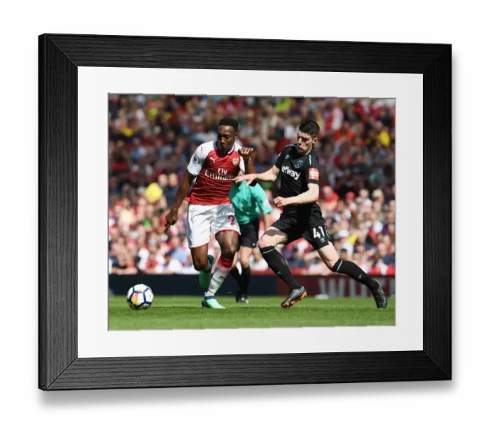 Framed Print : Clash at the Emirates: Welbeck vs. Rice in Arsenal's Battle against West Ham Framed Print : Clash at the Emirates: Welbeck vs. Rice in Arsenal's Battle against West Ham