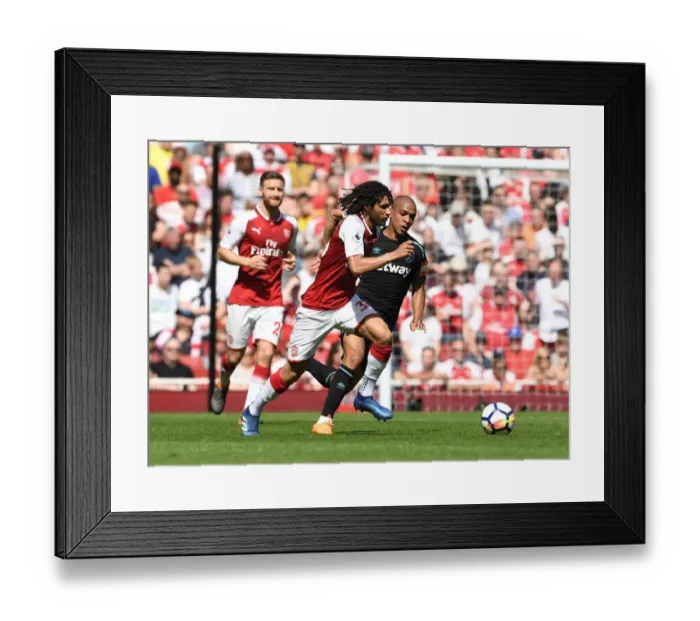 Framed Print : Arsenal vs. West Ham United: Premier League Clash at Emirates Stadium Framed Print : Arsenal vs. West Ham United: Premier League Clash at Emirates Stadium