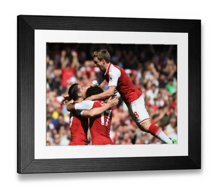 Framed Print : Arsenal Celebrate: Monreal, Xhaka, Iwobi Score Against West Ham