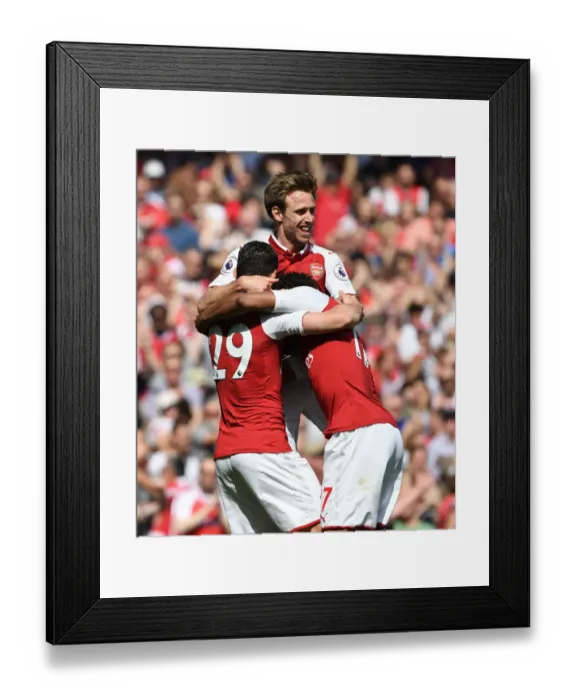Framed Print : Arsenal's Triumphant Trio: Monreal, Iwobi, Xhaka's Euphoric Celebration vs. West Ham United (2017-18) Framed Print : Arsenal's Triumphant Trio: Monreal, Iwobi, Xhaka's Euphoric Celebration vs. West Ham United (2017-18)