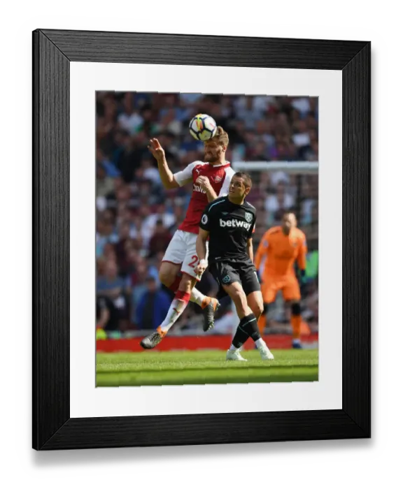 Framed Print : Arsenal vs. West Ham United: Premier League Clash at Emirates Stadium Framed Print : Arsenal vs. West Ham United: Premier League Clash at Emirates Stadium