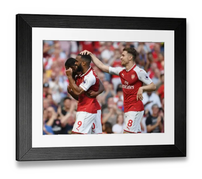Framed Print : Arsenal's Lacazette, Maitland-Niles, and Ramsey Celebrate Goals Against West Ham Framed Print : Arsenal's Lacazette, Maitland-Niles, and Ramsey Celebrate Goals Against West Ham