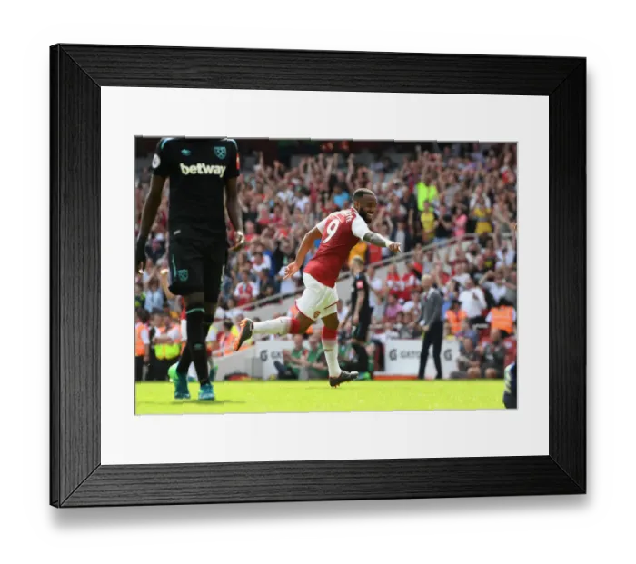 Framed Print : Alexandre Lacazette's Brace: Arsenal Crushes West Ham 4-1 in Premier League Showdown