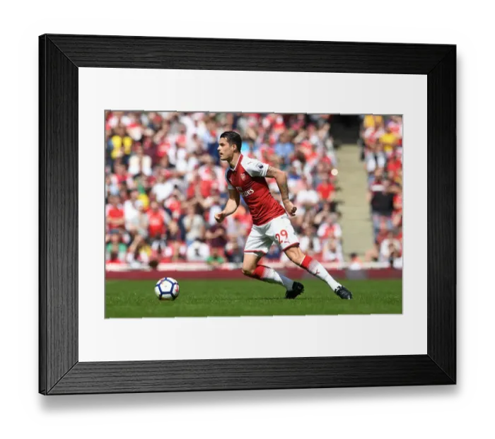Framed Print : Granit Xhaka in Action: Arsenal vs West Ham United, Premier League 2017-18 Framed Print : Granit Xhaka in Action: Arsenal vs West Ham United, Premier League 2017-18