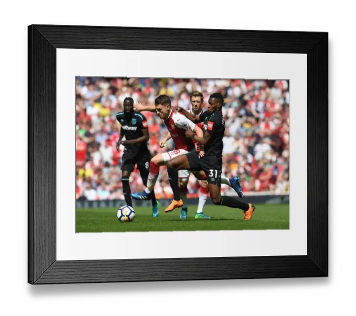 Framed Print : Arsenal's Aaron Ramsey Clashes with West Ham's Edimilson Fernandes in Premier League Showdown Framed Print : Arsenal's Aaron Ramsey Clashes with West Ham's Edimilson Fernandes in Premier League Showdown