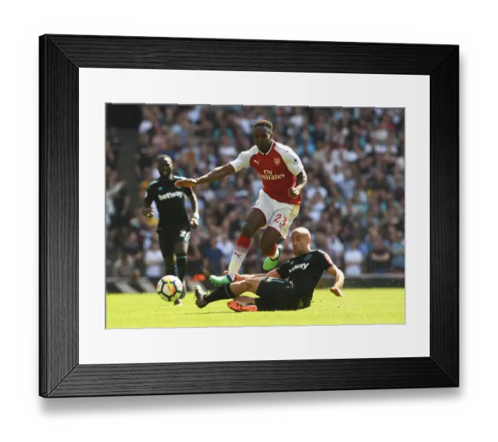Framed Print : Welbeck Soars Past Zabaleta: Thrilling Moment from Arsenal vs. West Ham Clash Framed Print : Welbeck Soars Past Zabaleta: Thrilling Moment from Arsenal vs. West Ham Clash