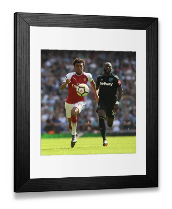Framed Print : Arsenal vs. West Ham: Iwobi vs. Masuaku in Intense Battle at Emirates Stadium Framed Print : Arsenal vs. West Ham: Iwobi vs. Masuaku in Intense Battle at Emirates Stadium
